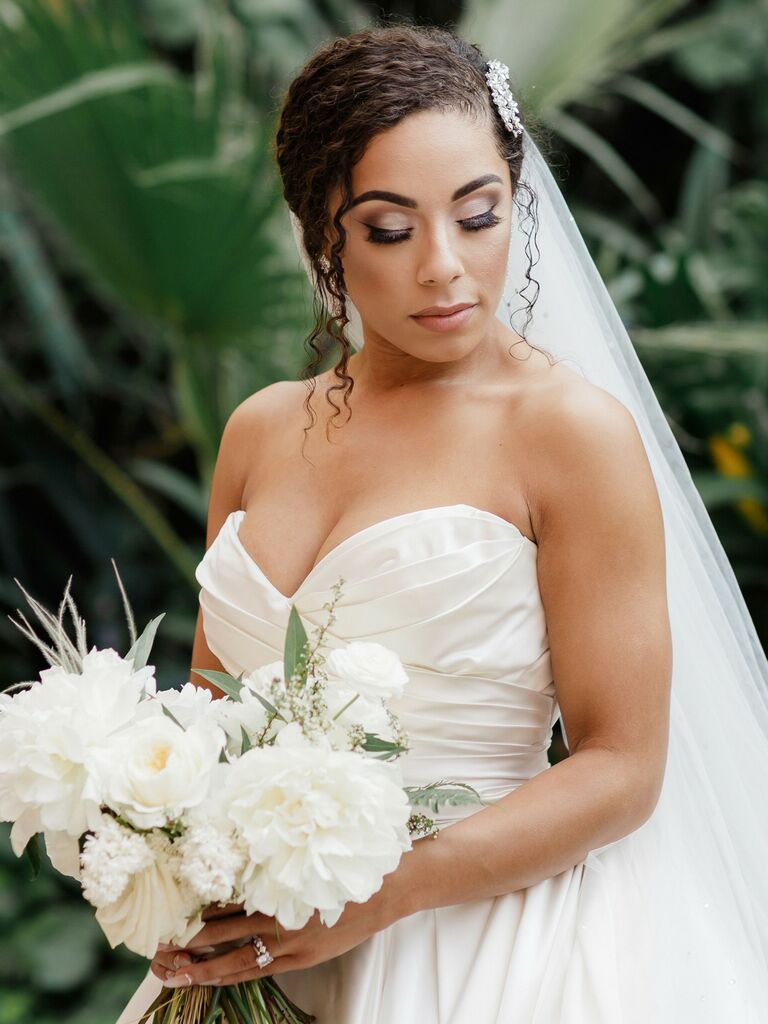 side hairstyles for wedding low side bun with veil