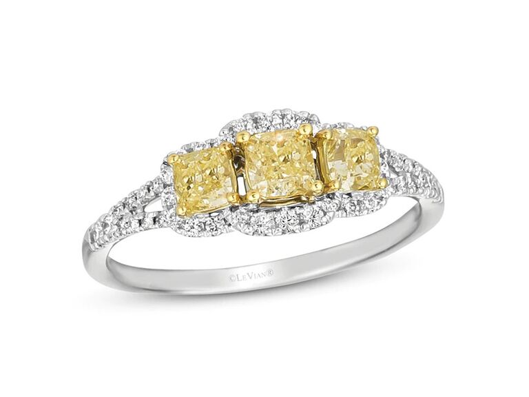 jared yellow diamond engagement ring with three cushion cut yellow diamond center stones round diamond halo diamond sides and plain white gold band