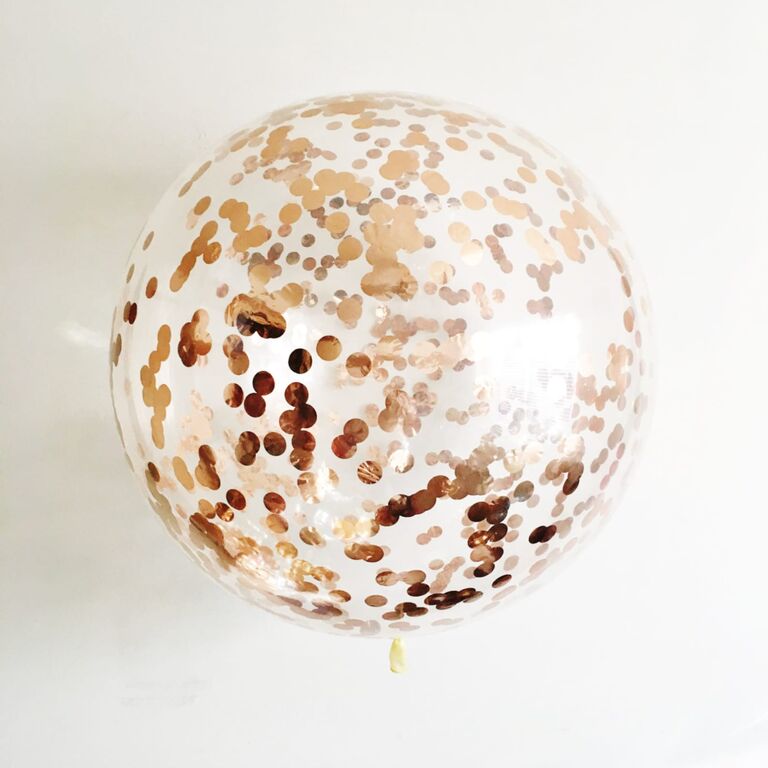 Round confetti-filled balloon for a bachelorette party. 