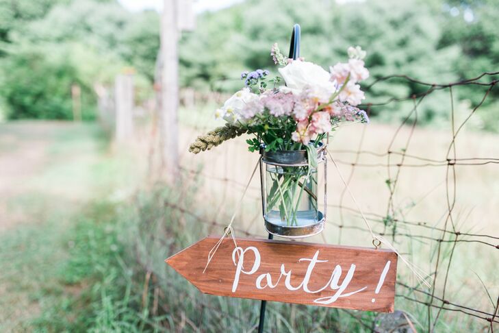 Megan always knew she wanted to get married at her family’s home in North Yarmouth, Maine, and with its farmhouse, gardens and acres of wheat-filled fields, it isn't difficult to see why. The couple carefully chose every decorative element to match the elegant-meets-rustic environment.