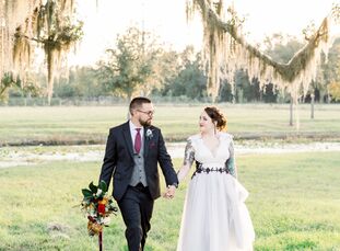 Stephen proposed to Emily  on Halloween night. To honor their favorite holiday, they incorporated fall and gothic elements into their wedding, using a