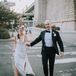 Formal Couple in V-Neck Dress and Black Tuxedo