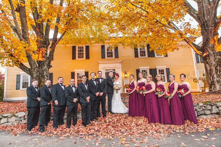For their wedding party’s attire, Sarah and Sean wanted a classic, semi-formal look that captured the day’s autumnal feel. The bridesmaids donned floor-length A-line gowns with strapless, v-shaped and one-shoulder necklines in a bright shade of burgundy, while the groomsmen wore classic charcoal gray suits with burgundy calla lily boutonnieres to complement the girls.