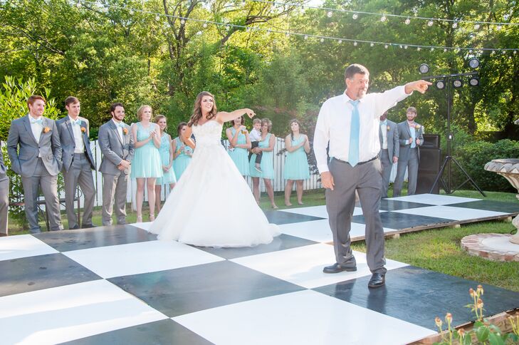 Their father-daughter dance was ultra unique! “We danced to a medley of songs including: 'Butterfly Kisses,' 'The Twist,' 'Grease Lightnin,' 'Thriller,' 'The Wobble,' 'Jump on It,' 'YMCA' ... the list goes on and on! It was so fun! My dad and I practiced for weeks,” Candace says. In addition to busting out a few moves (including some disco), Lauren's father made their dance floor.