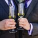 Grooms With Champagne Flutes