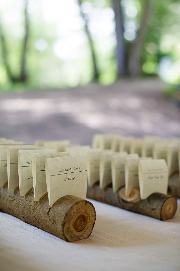 Guests found their seating assignments on tented escort cards watermarked with a sketch of the castle.