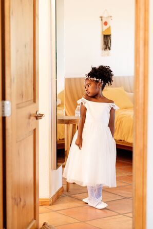 Flower Girl With Updo and Jeweled Headband