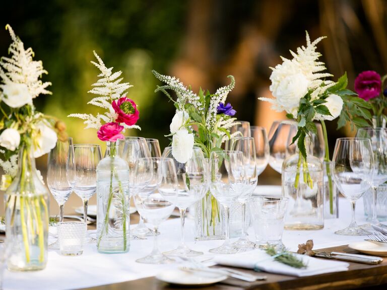 Delicate pale fern floral centerpieces.