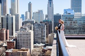 Bride, Groom and Balcony With City View