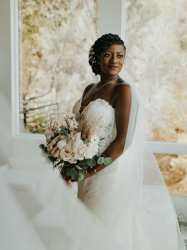 Bride looks off into the distance. 