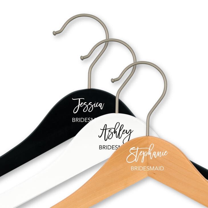 A set of personalized bridesmaid clothes hangers from The Knot Shop