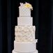 Five-Tier Wedding Cake With Iced Rose Detailing