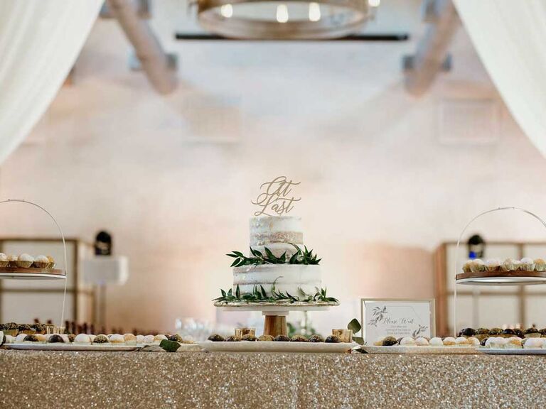 Small wedding cake with green garland strands