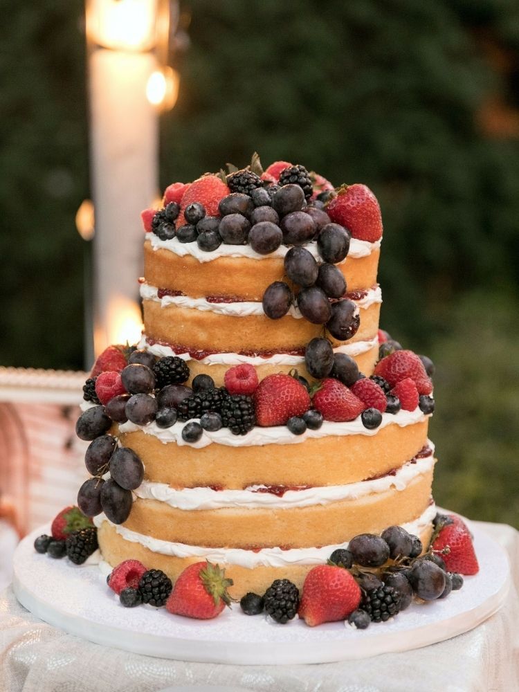 two-tier naked cake with fresh berries