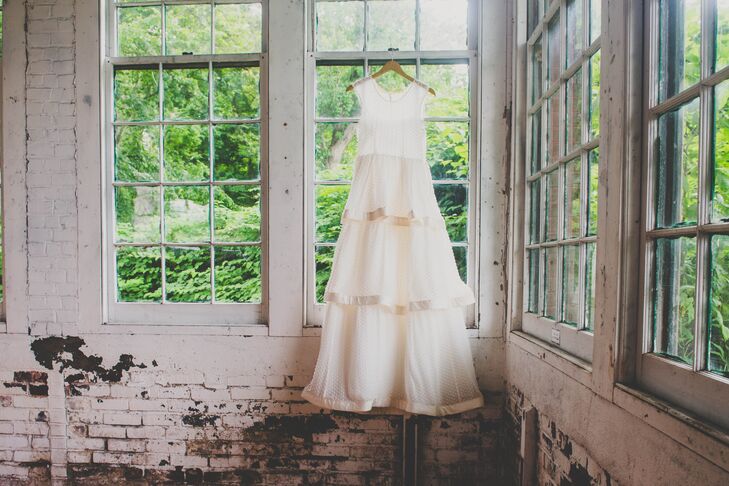 "My wedding dress was from J.Crew, but it was customized by my friend to include three tiers," Katie says. "I saw the dress and it reminded of a milk-glass vase, which I collect, and I decided I could customize it."