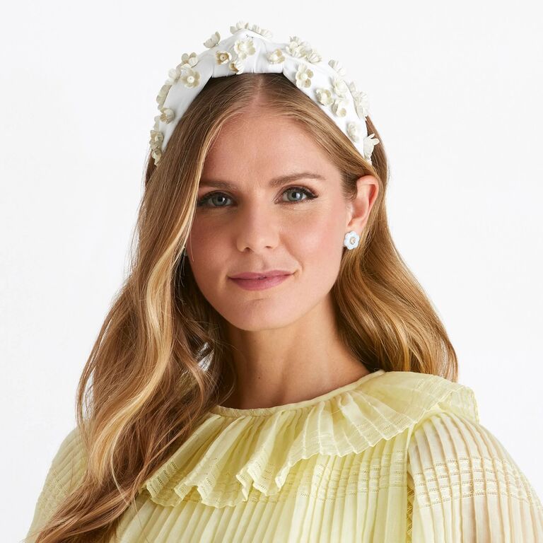 Knotted ivory wedding headband with hand-sewn floral appliqués