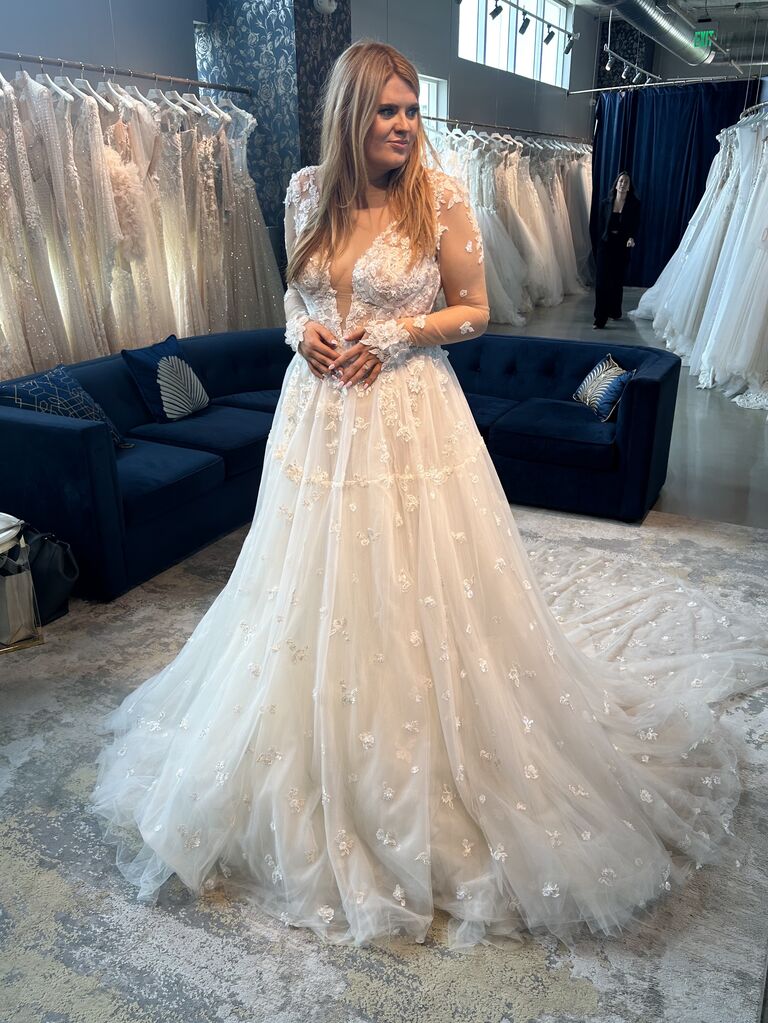 woman in long sleeve wedding dress