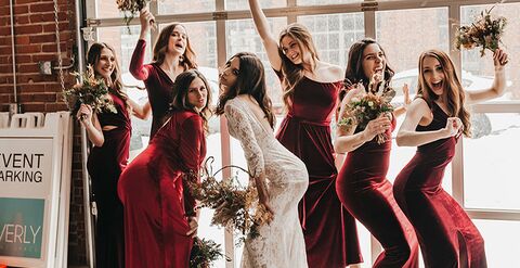 Bride and bridesmaids posing together