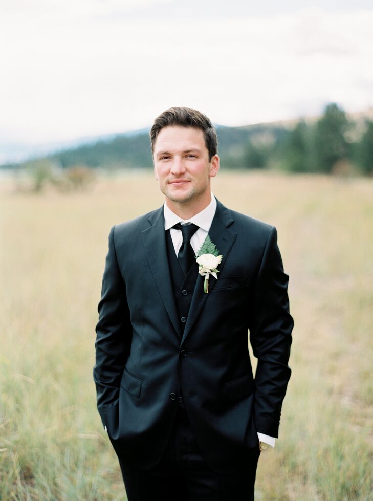 Brandon and his groomsmen wore traditional black suits, crisp white button-downs and black ties.