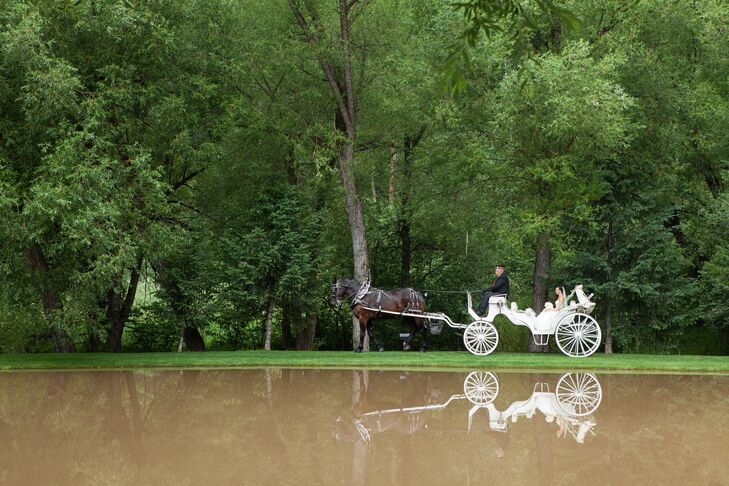 An iconic horse drawn carriage drove Ashley around the grounds and over to Kyle in front of the castle for their first look.