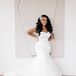 Bride in Trumpet Wedding Dress With Sweetheart Neckline