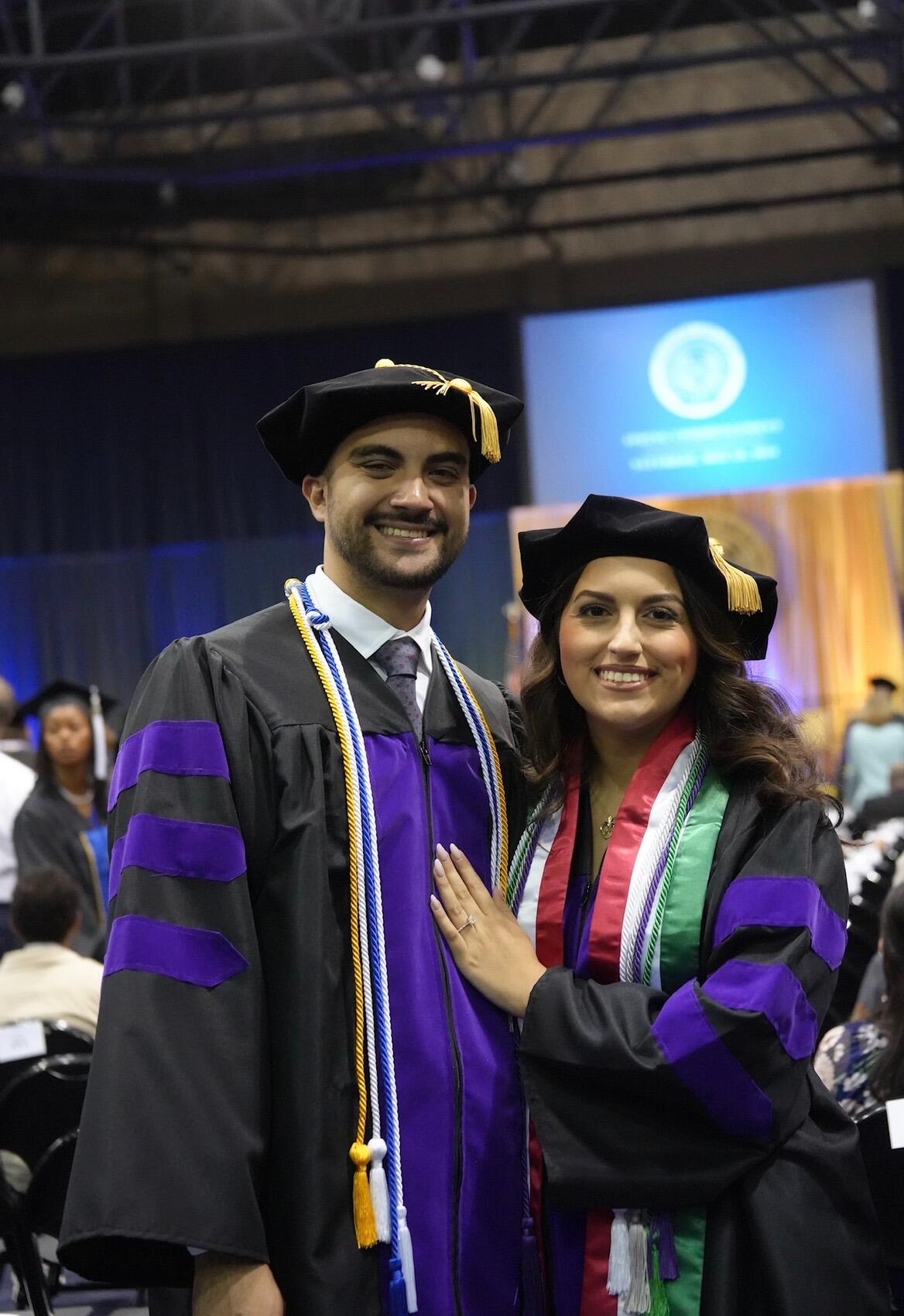 Graduating law school side by side, celebrating years of hard work and perseverance together.