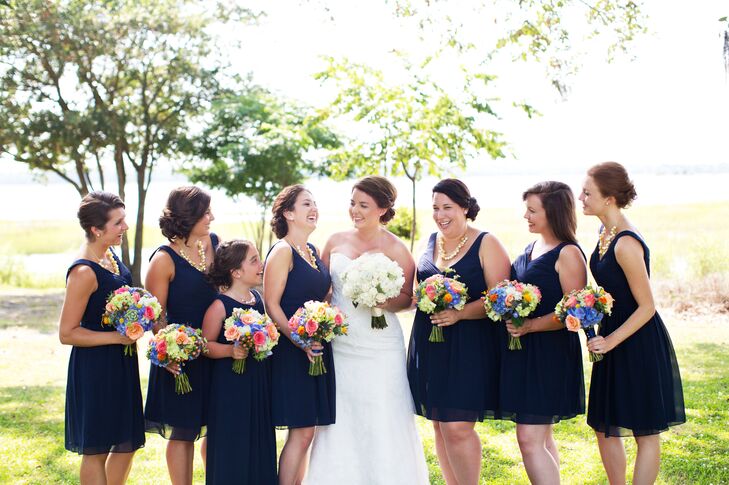 "One of my favorite elements ended up being our bridesmaid bouquets," says Jessica. "With a very basic color palette for attire, I knew I wanted something bright for their bouquets, and our florist did a phenomenal job with bringing this vision to life!"