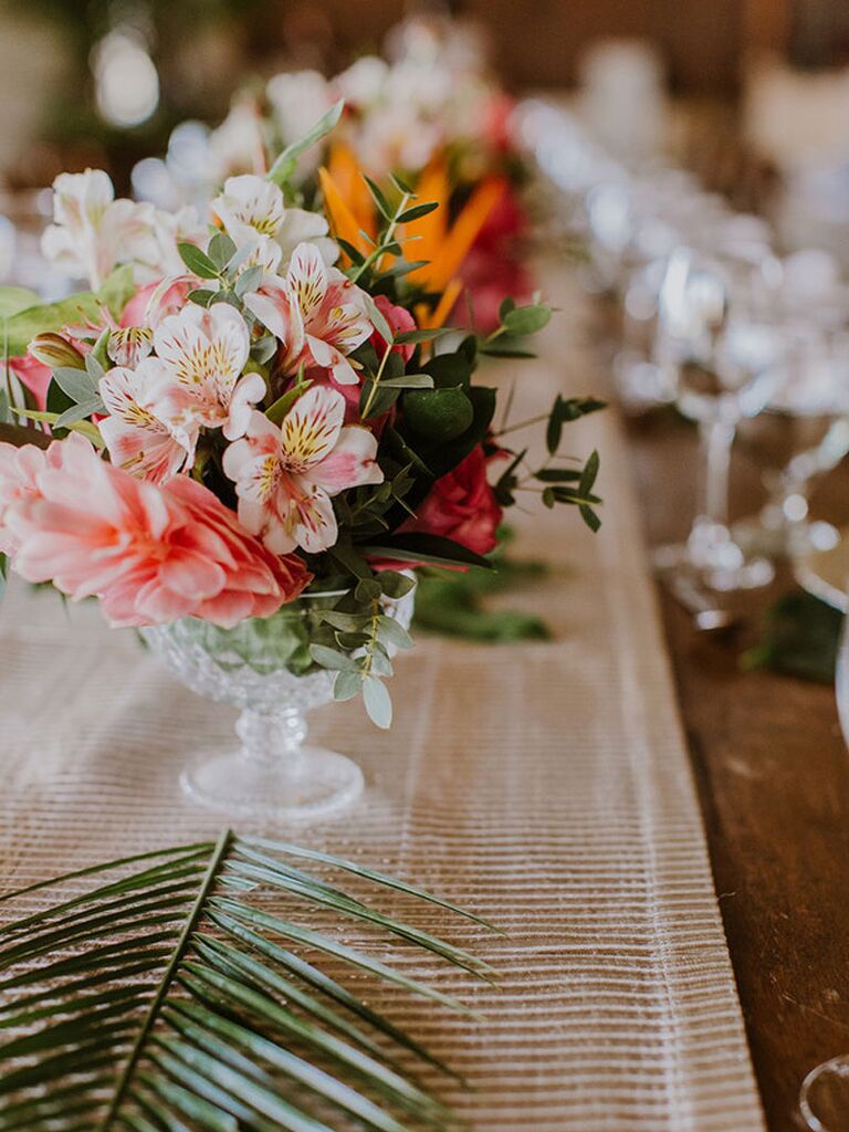 Light pink alstroemeria on wedding reception tables