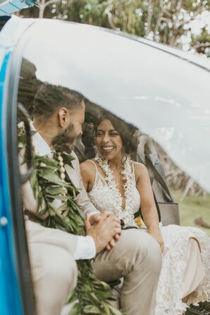 Couple Wearing Leis During Hawaii Elopement Helicopter Ride