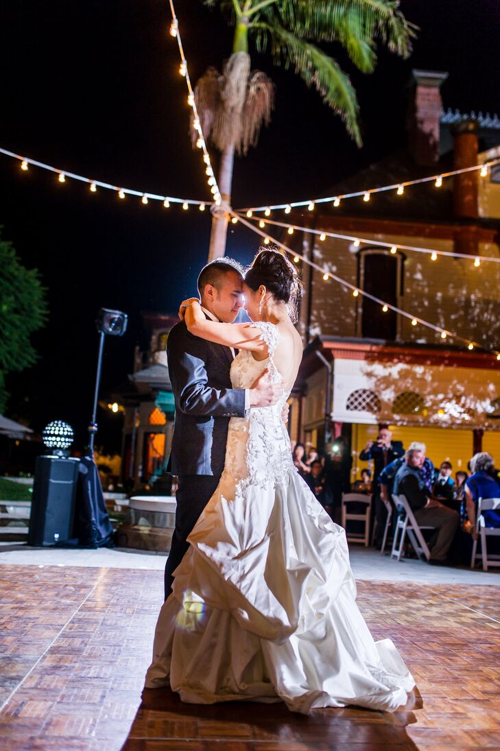 Nighttime First Dance Under Hanging Lights