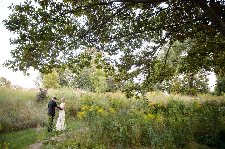 The couple used a natural color palette of green and ivory to bring their desired theme of "understated elegance" to life. "We wanted our style to reflect the venue, which was so elegantly designed," Christina says. "Lots of trees, flowers, clean lines and the natural beauty of Lincoln Park."