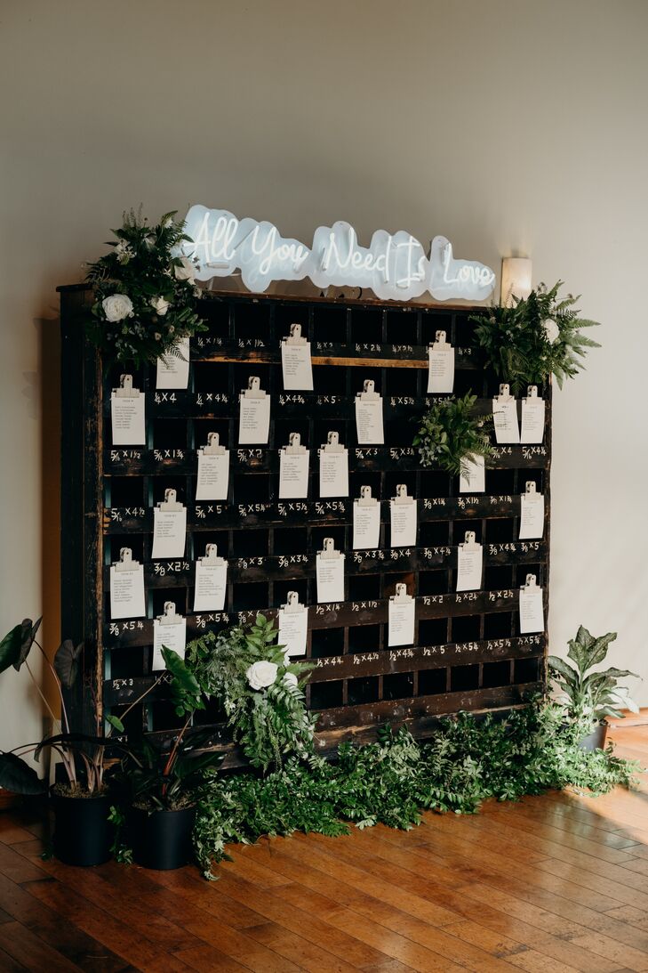 Modern Seating Chart Display with Greenery