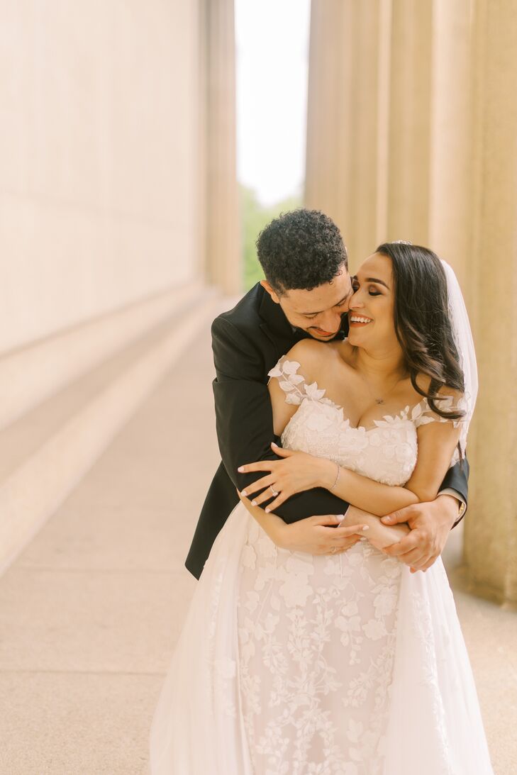 Couple Hugging During Portraits at The Parthenon in Nashville, Tennessee