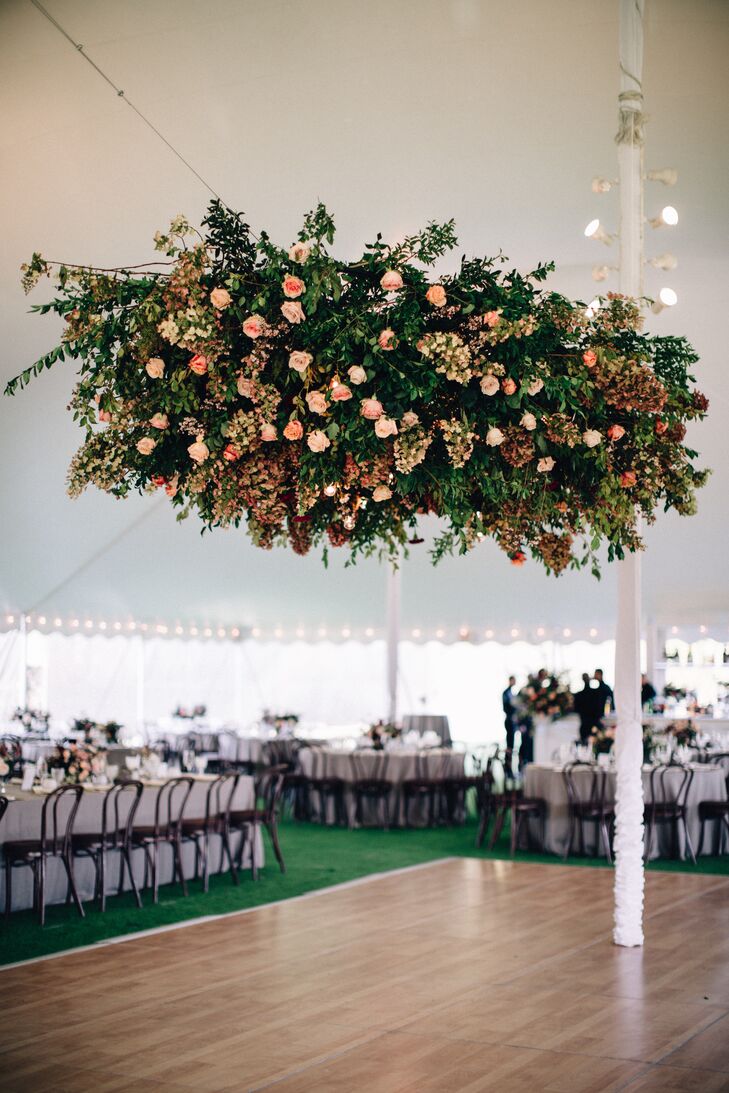 Hanging Flower Arrangement of Pink Roses and Greenery over Dance Floor