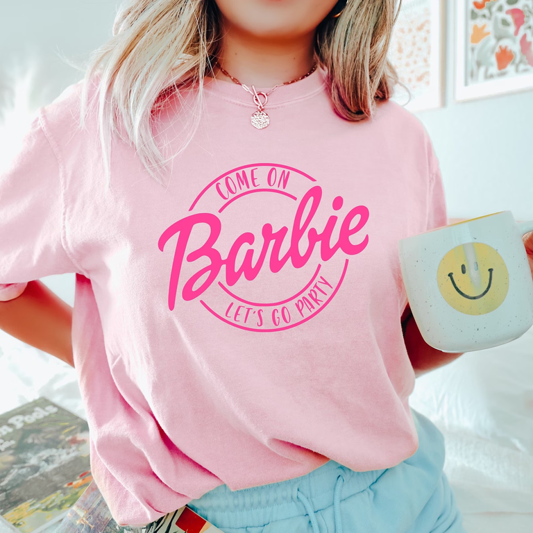 A pink shirt reading, "Come on Barbie, Let's go party" for your bach party