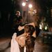 Groom Dipping Bride With Pearl Headband, Short Hairstyle in a Kiss During First Dance