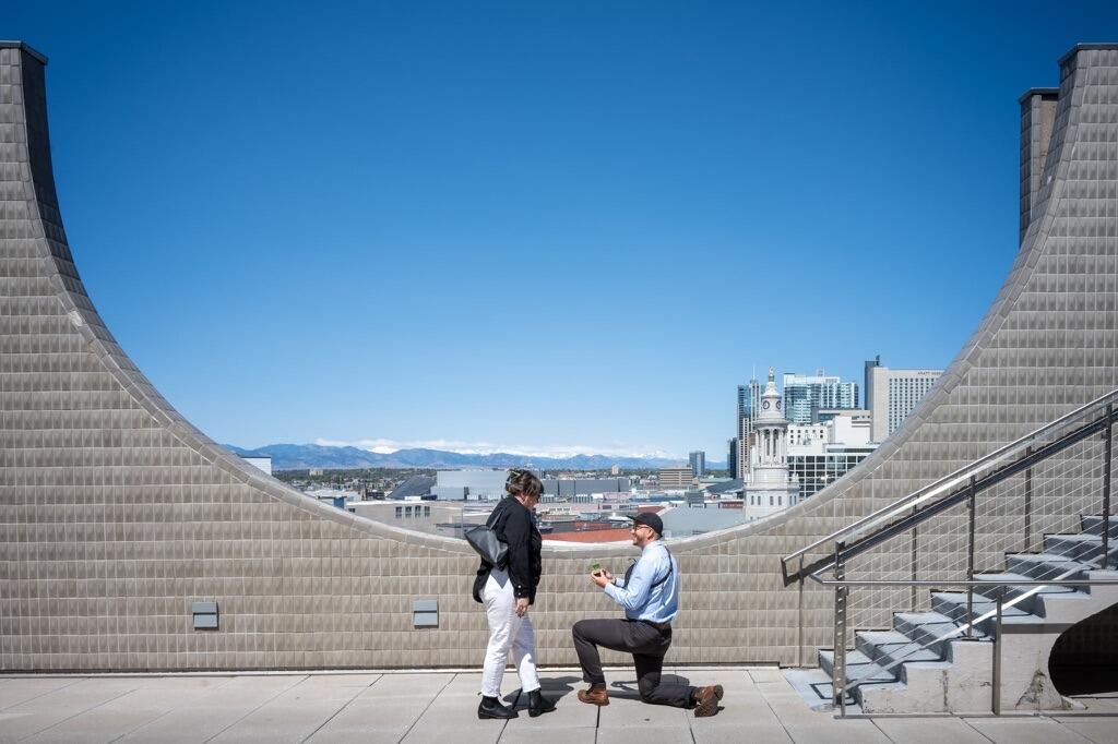 Surprise rooftop engagement at the Denver Art Museum