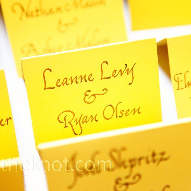 The couple’s calligrapher wrote guests’ names and table numbers in a casual font, fitting the laid-back wedding vibe.