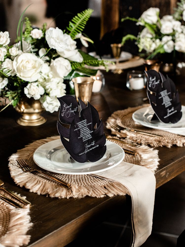 glam black-and-white tropical place setting
