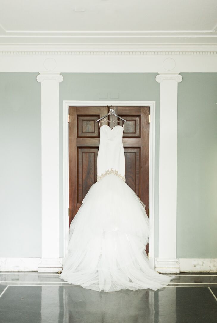 Bonnie's Enzoani wedding gown featured a trumpet-style silhouette with beading along the knee.