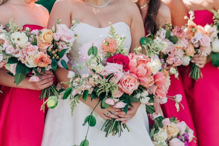 Brides and Bridesmaids With Vibrant Fuchsia Dresses and Bright Bouquets in Shades of Pink