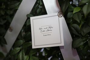 Glamorous Escort Card Display on Leaf Wall