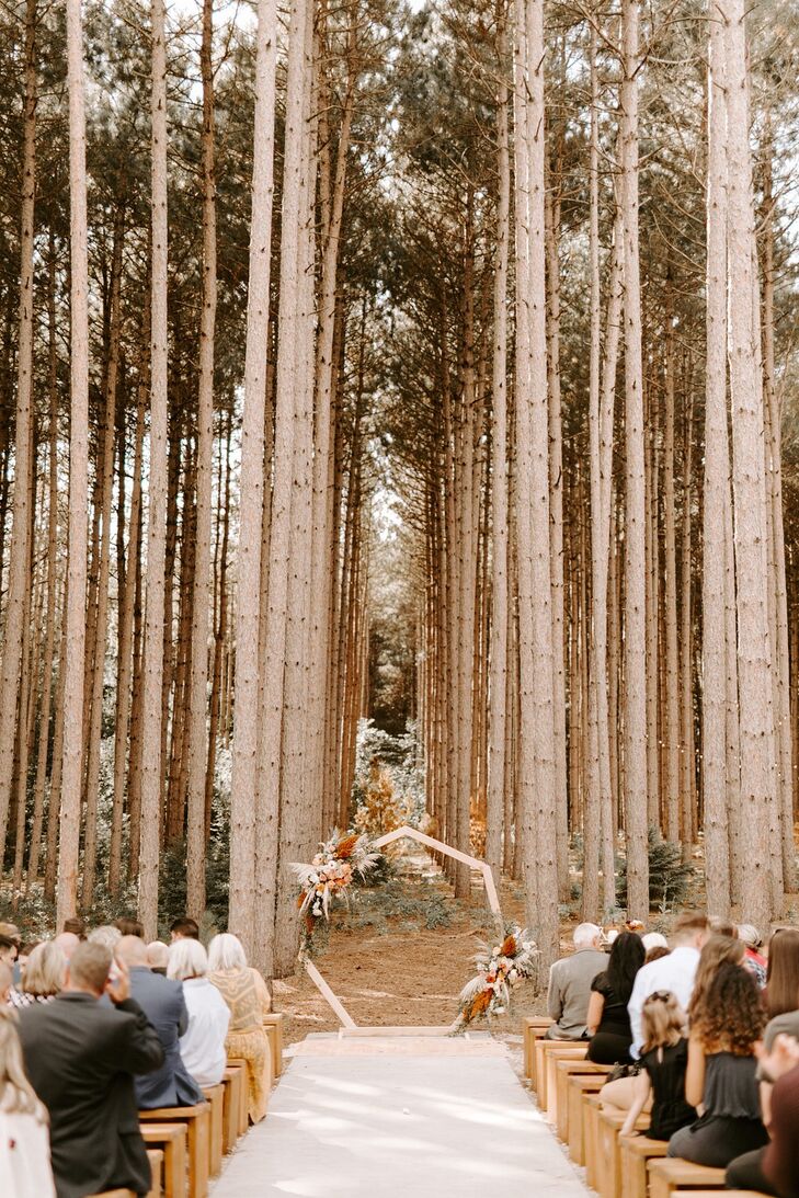 Bohemian Forest Ceremony with Geometric Wedding Arch, Benches and Aisle Runner