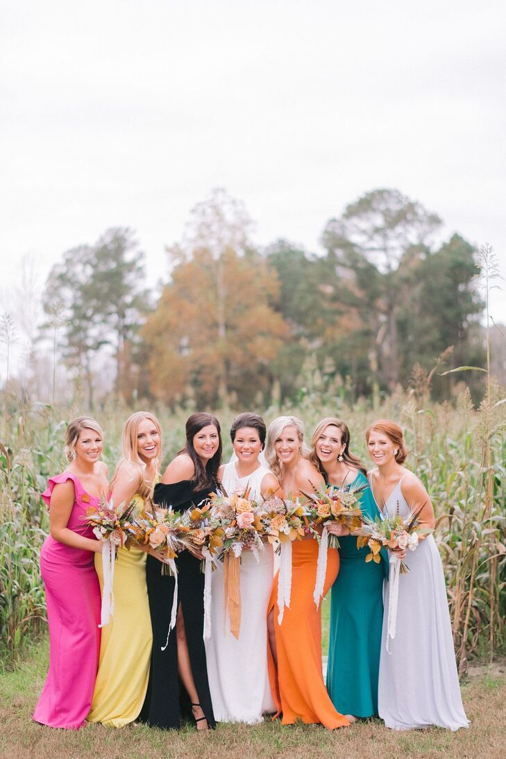 Bride Posing With Bridesmaids in Bright Dresses on Farm in Chadbourn, North Carolina
