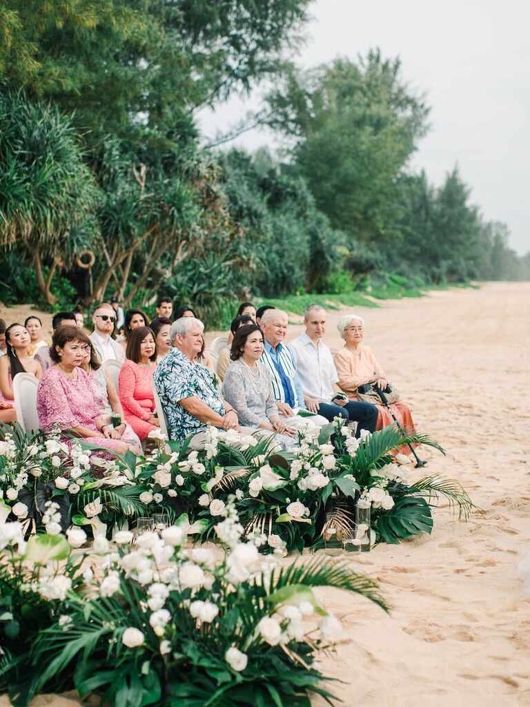 Guests at beach wedding in Thailand