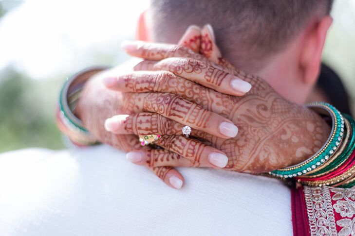 Hand With Henna and Engagement Ring