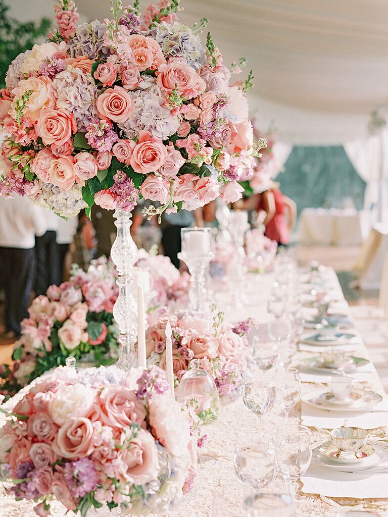 Pink floral centerpiece at fairytale-themed wedding