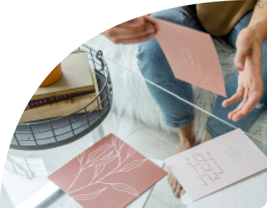 wedding invitation cards on a table