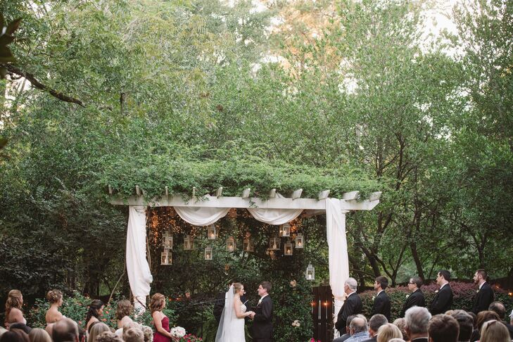 The couple exchanged vows during a sunset garden ceremony with a shabby-chic vibe. "I knew that I wanted to stay true to the style of the venue and to our South Carolina routes," says Stacy. "We wanted to keep it classic, formal and romantic with lots of candles."