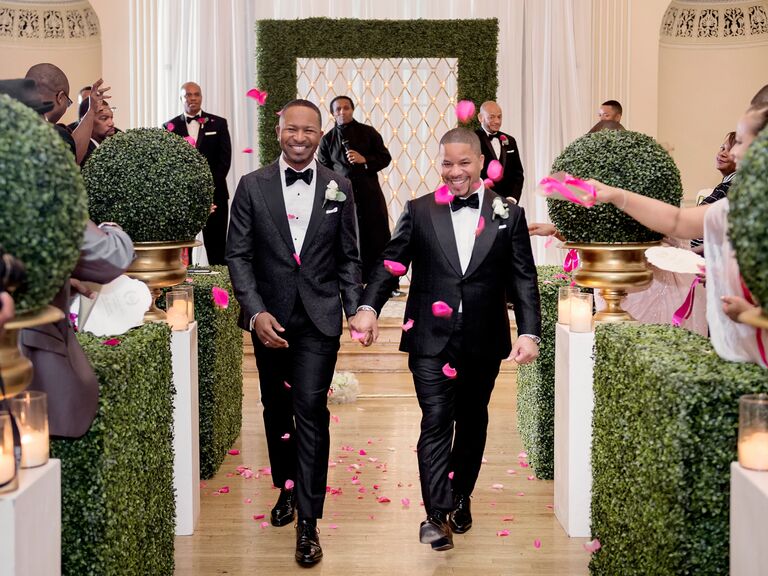 couple walking up the aisle for ceremony exit